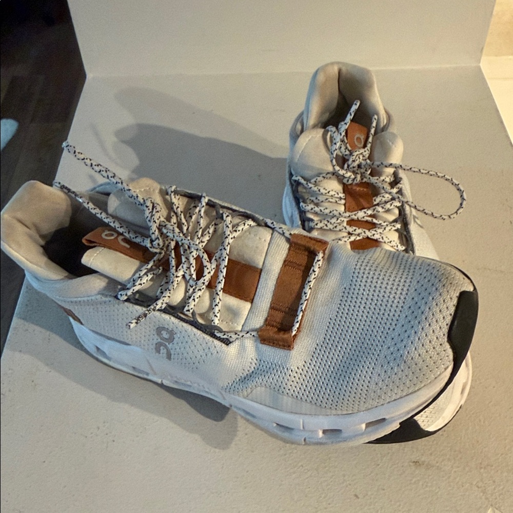 On Running White and Brown Sneakers